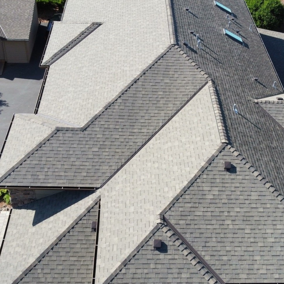 Circle shaped image of a roof, links to Roofing page