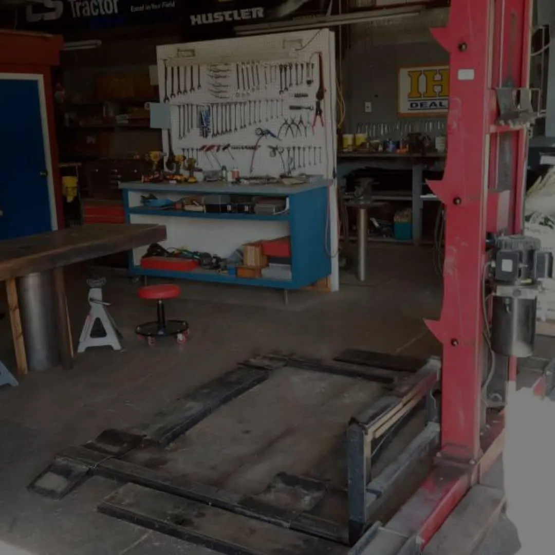 ZD Enterprises workshop with tools and equipment highlighting 31+ years of experience in Cuyuna engine parts and repairs