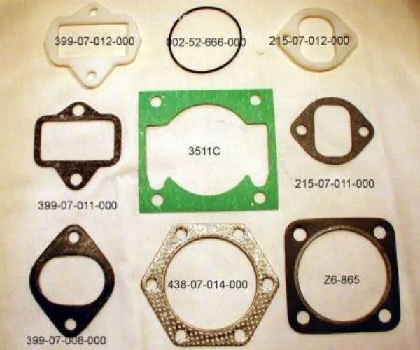 Cuyuna engine gaskets and intake insulators for 215, 230, 430, UL II 02, and 2si 460 series engines, including 430 intake insulator part 399-07-012-000