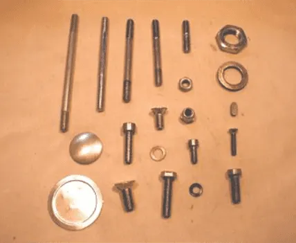 Cuyuna and 2si engine hardware items including bolts, washers, and fasteners