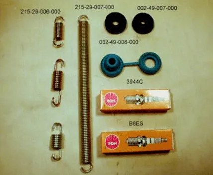 alt="Cuyuna and 2si engine exhaust system springs, rubber isolators, and BBES spark plugs