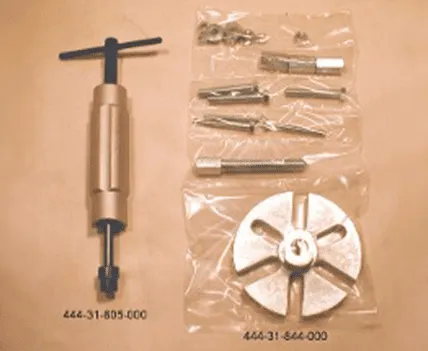 Cuyuna engine special tools including flywheel puller and piston pin puller