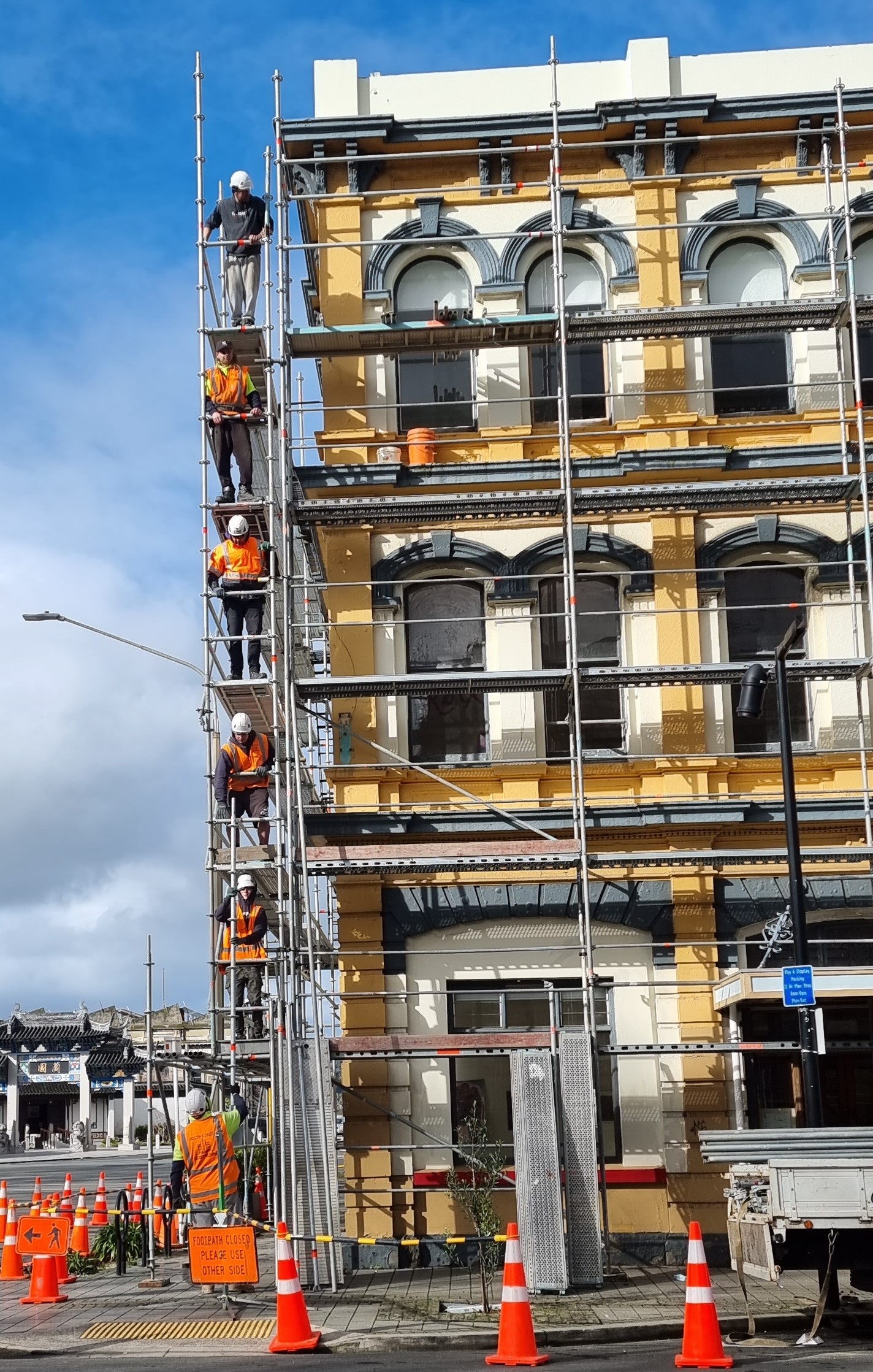 Roofing and scaffold setup for residential renovation in Dunedin