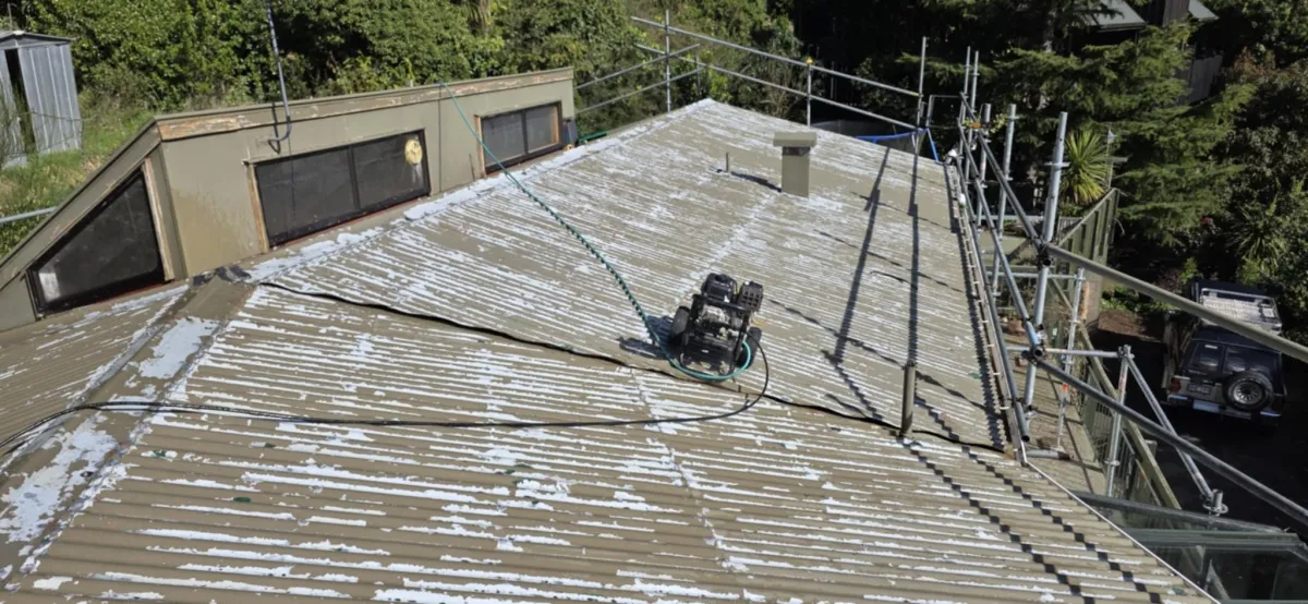 Corrugated red metal roof repair completed by Manson Roofing in Dunedin