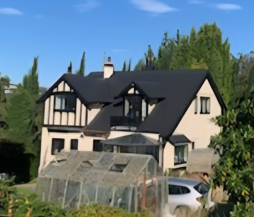 Dark grey longrun roofing replacement in progress with scaffolding in Otago