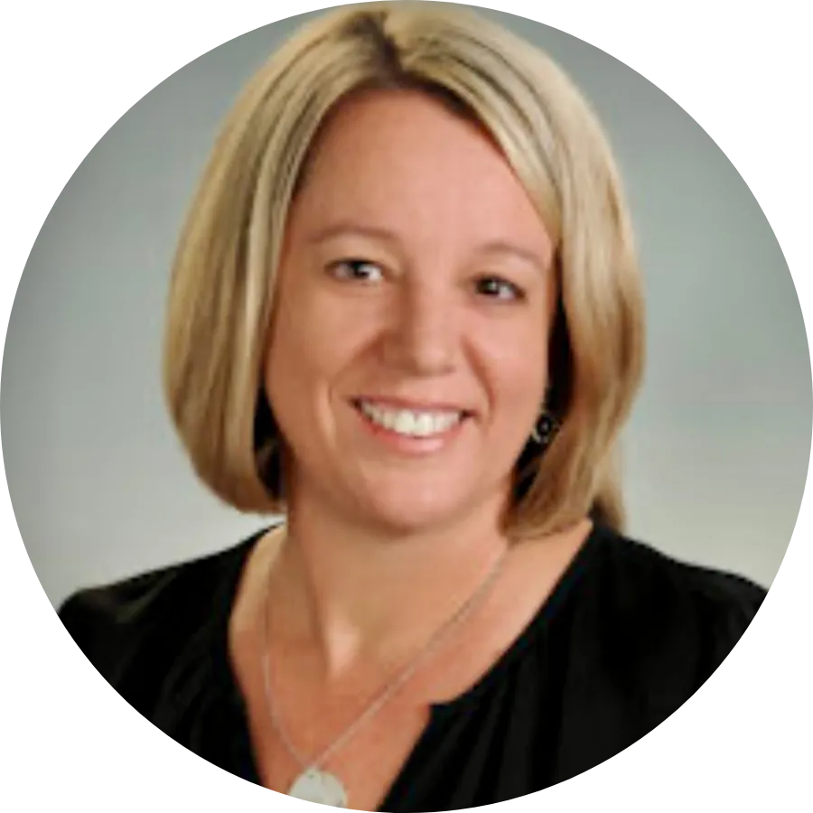 Portrait of Jennifer Ranson, Family Nurse Practitioner at Total Health Pros, smiling and wearing a black top and silver necklace.