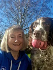 Image of Jo and Milo her Springer Spaniel dog.
