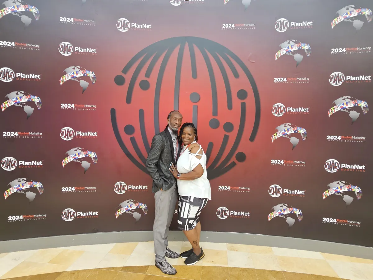 two person standing on gray tile paving