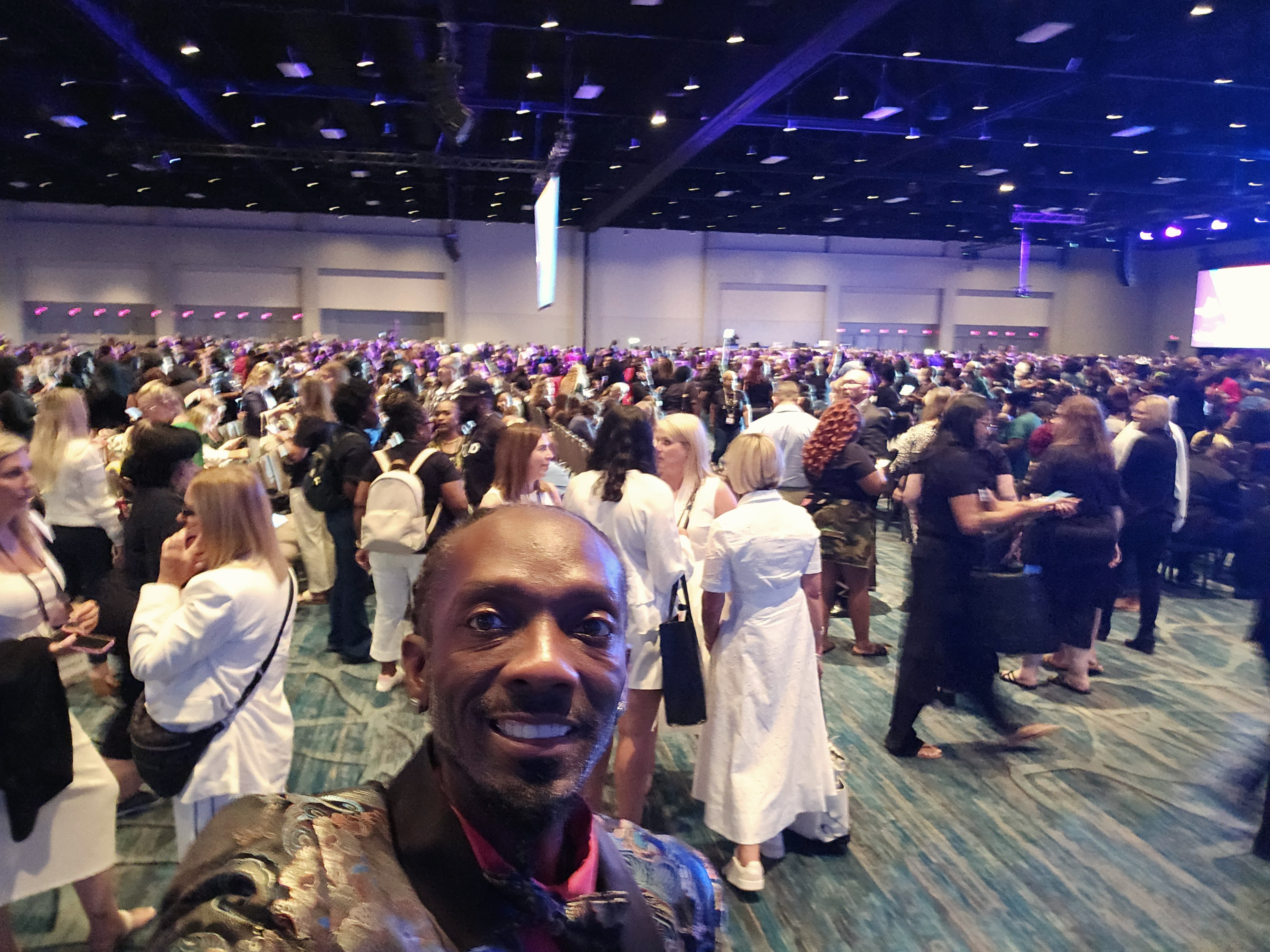 architectural photography of building with people in it during nighttime