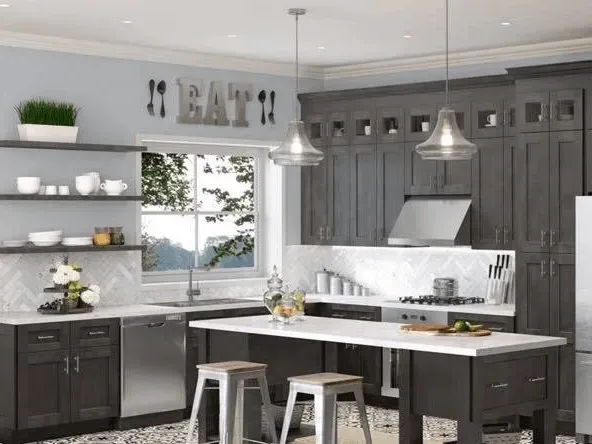 Remodeled kitchen in West Chester Township, OH, featuring modern cabinetry, granite countertops, and natural light.