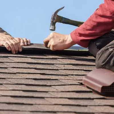 shingle roofing specialists working