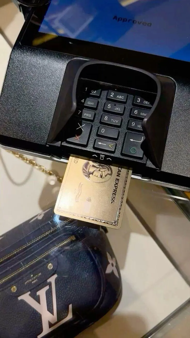 a stack of coins sitting on top of a reflective surface