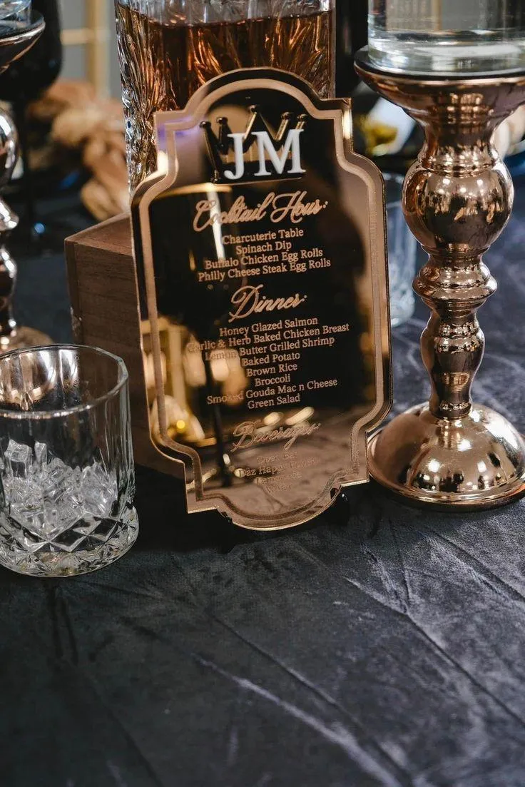 a note that says pay debt next to a pen and glasses