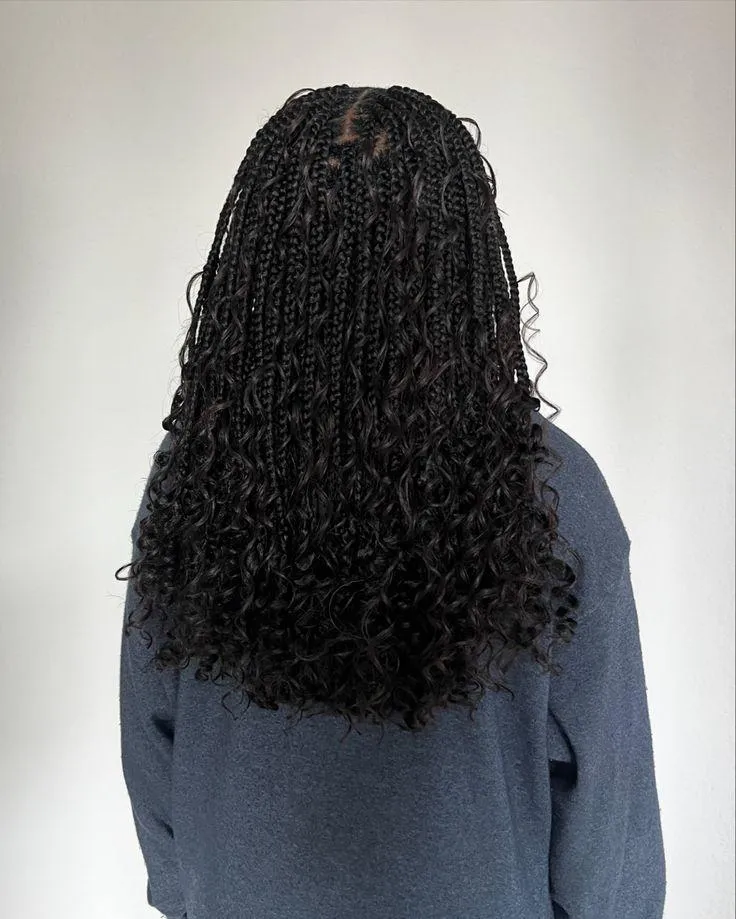 Black knotless braids with Boho curls