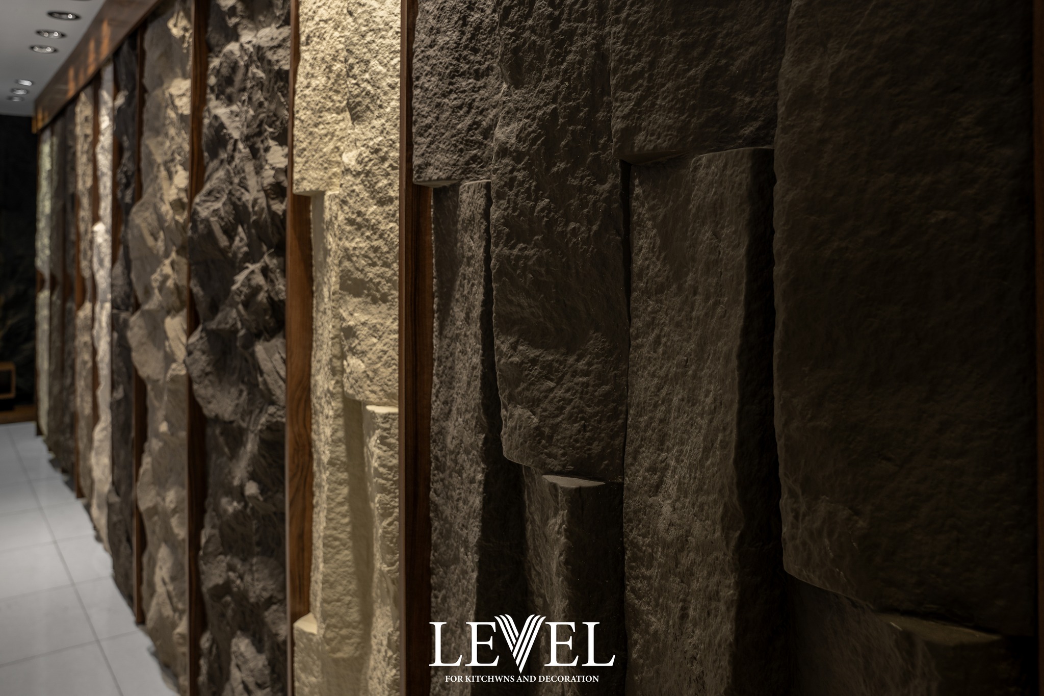 A modern living room with a mounted tv.