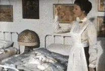 Mary Poppins magically cleaning up the room