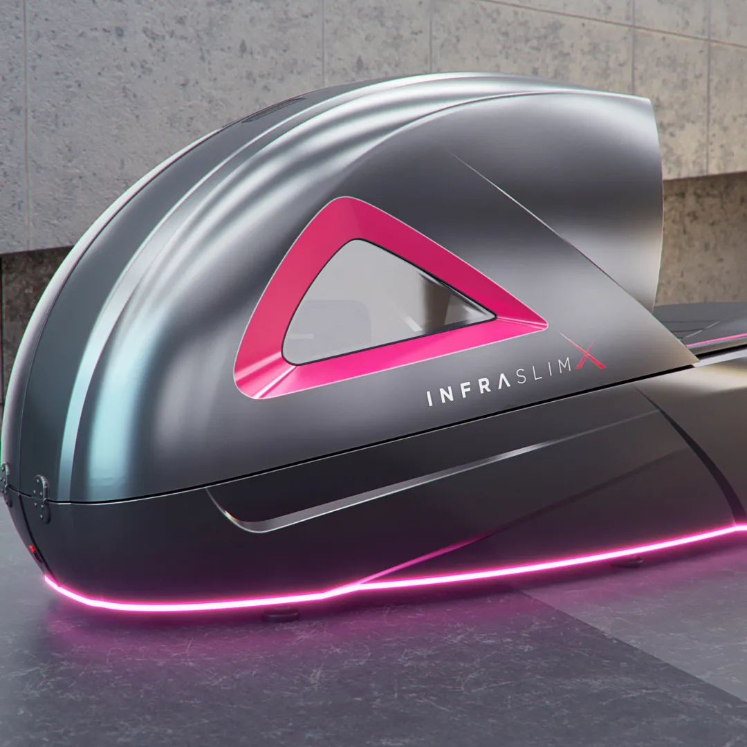 InfraslimX machine in sleek black and pink design, glowing with LED lights. The futuristic shape features a prominent triangular window with glowing accents, highlighting its cutting-edge technology.