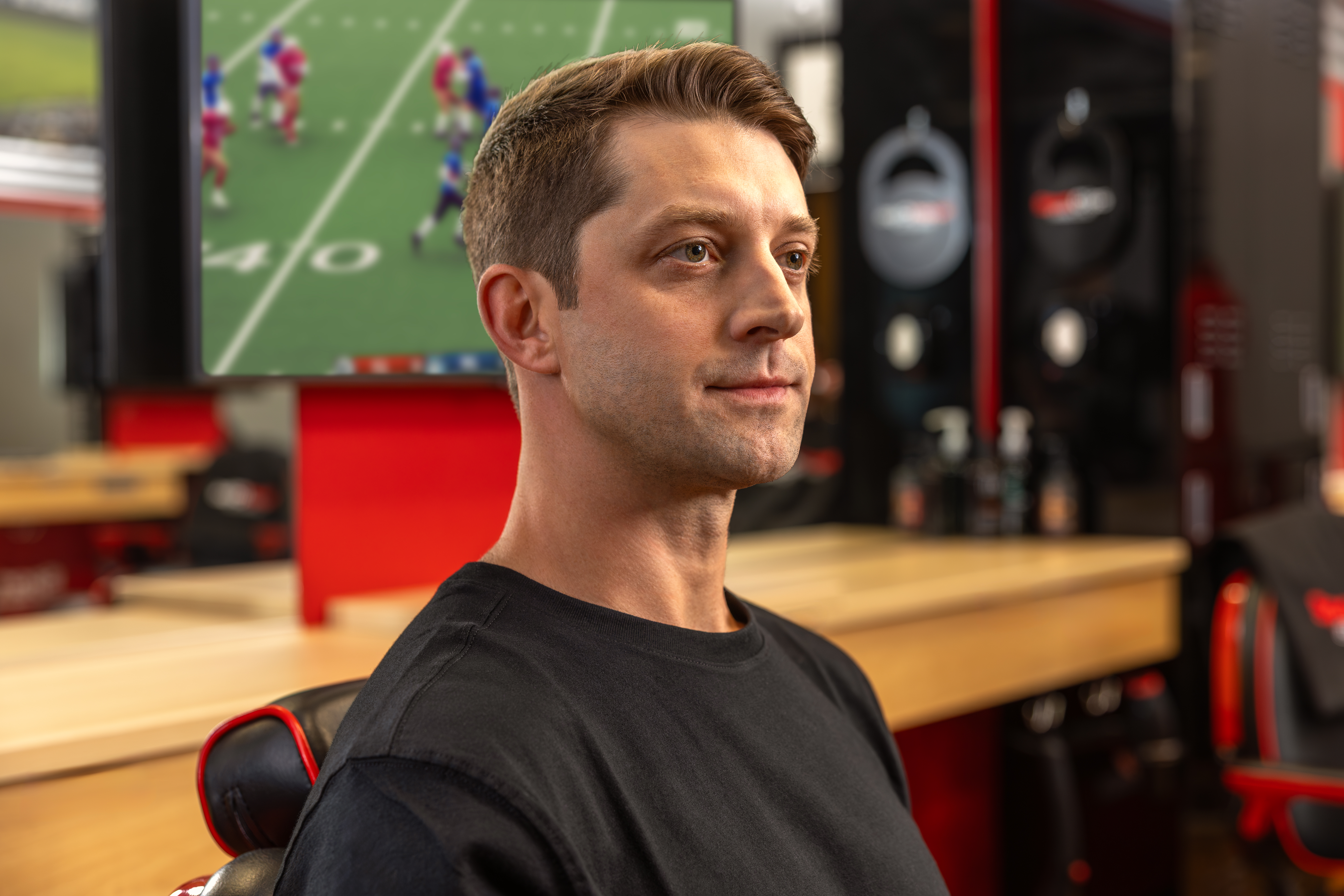 a close up of a person cutting another persons hair