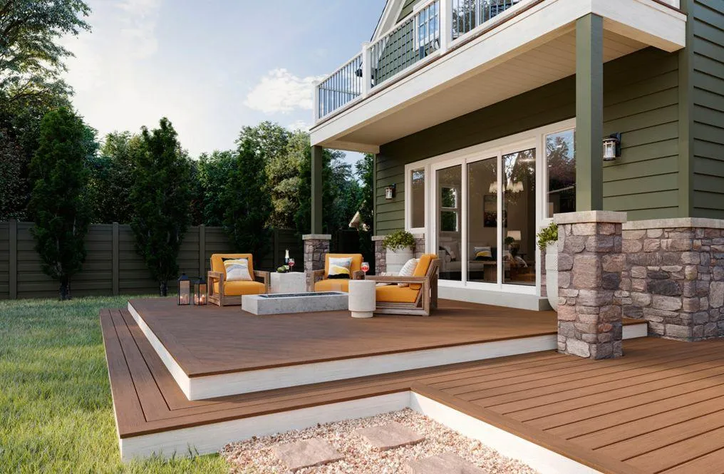 Elegant backyard deck design with comfortable outdoor furniture and beautiful landscaping.