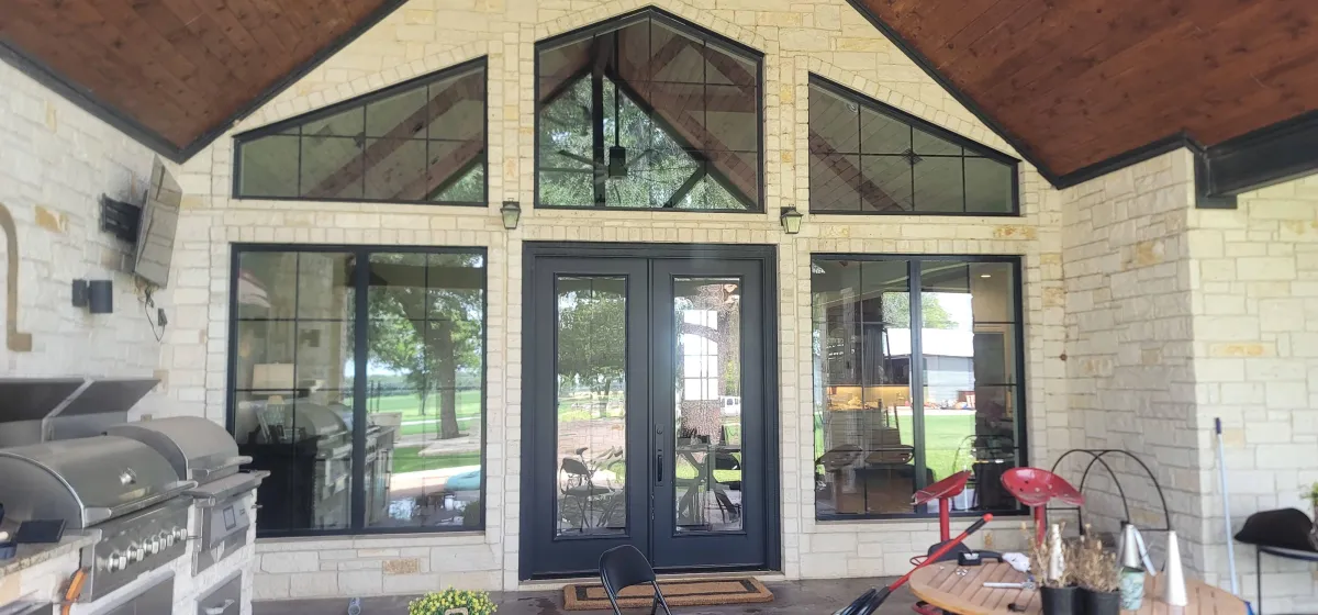 Commercial window cleaning service showing spotless glass storefront and entrance maintained by Shinetime Solutions