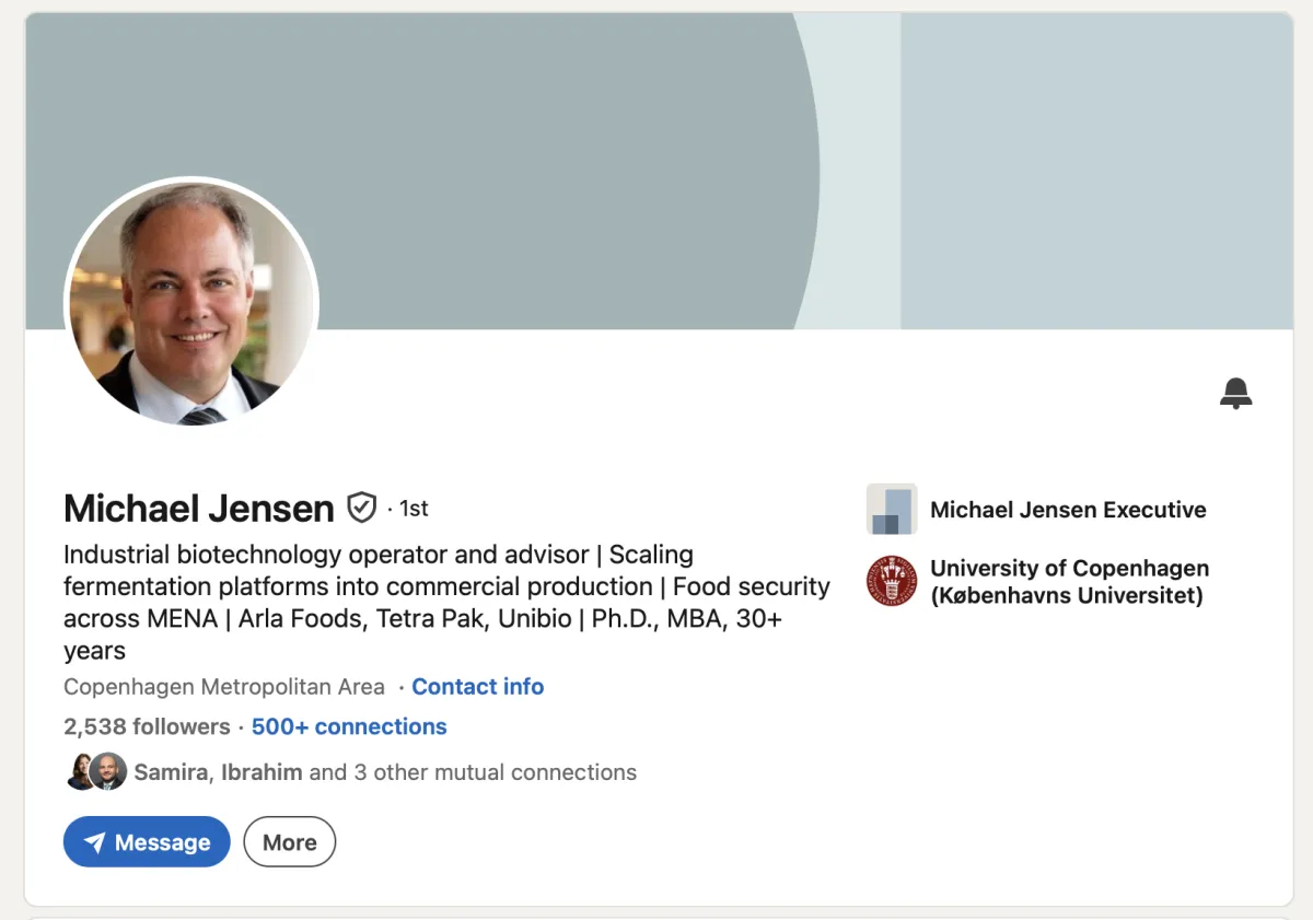 Before: Generic LinkedIn profile for a senior industrial biotechnology executive, listing only a plain headline ("Industrial biotechnology operator and advisor") and a credential-style bio naming companies and degrees, with a default LinkedIn banner. Example of a vanilla executive LinkedIn profile that undersells real commercial wins.