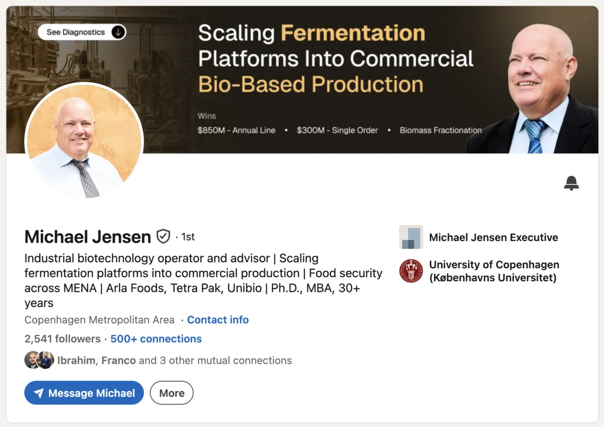 After: LinkedIn profile rewrite for a senior industrial biotechnology executive, showing a custom banner headline "Scaling Fermentation Platforms Into Commercial Bio-Based Production" with quantified wins including an $850M annual production line, a $300M single order, and biomass fractionation expertise. Example of an executive LinkedIn profile transformation generated by the Profile De-Vanillaizer.