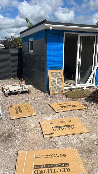 Garden office under construction with composite cladding — garden building project in Reading