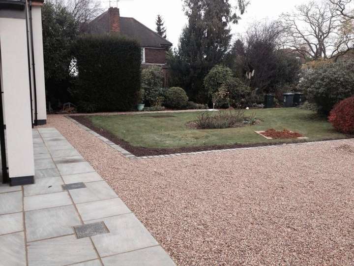 Gravel driveway with porcelain paving pathway and garden — landscaping project in Reading, Berkshire