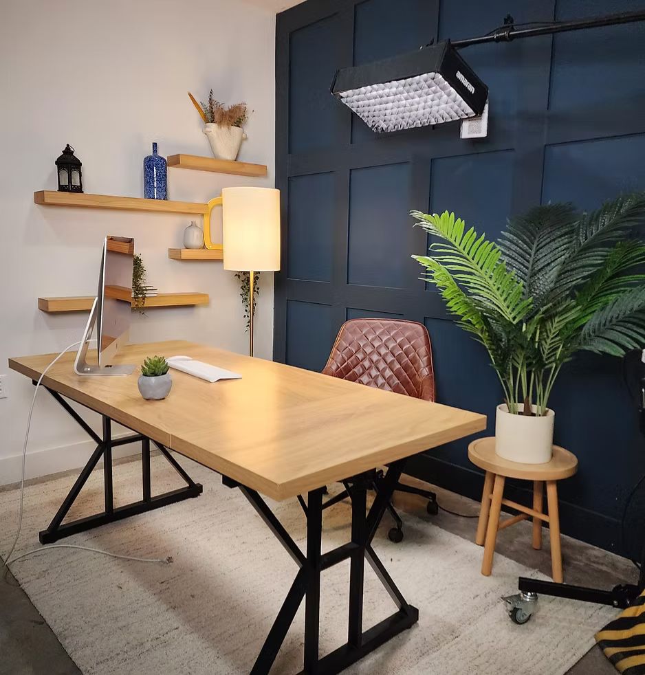 Wide banner of a chic studio content zone with seamless paper and seating