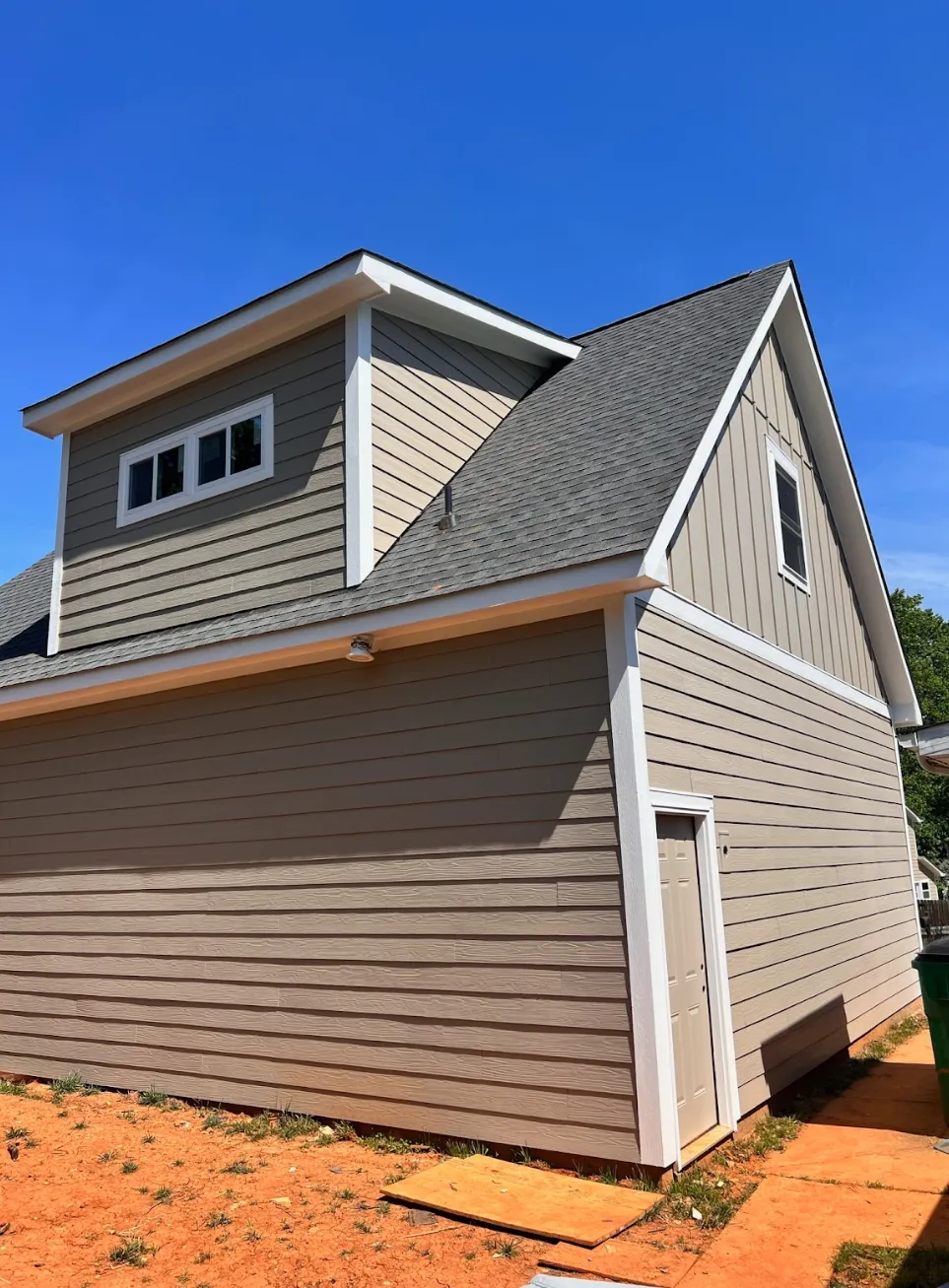 Home addition in Charlotte featuring seamless exterior integration and matching roofline