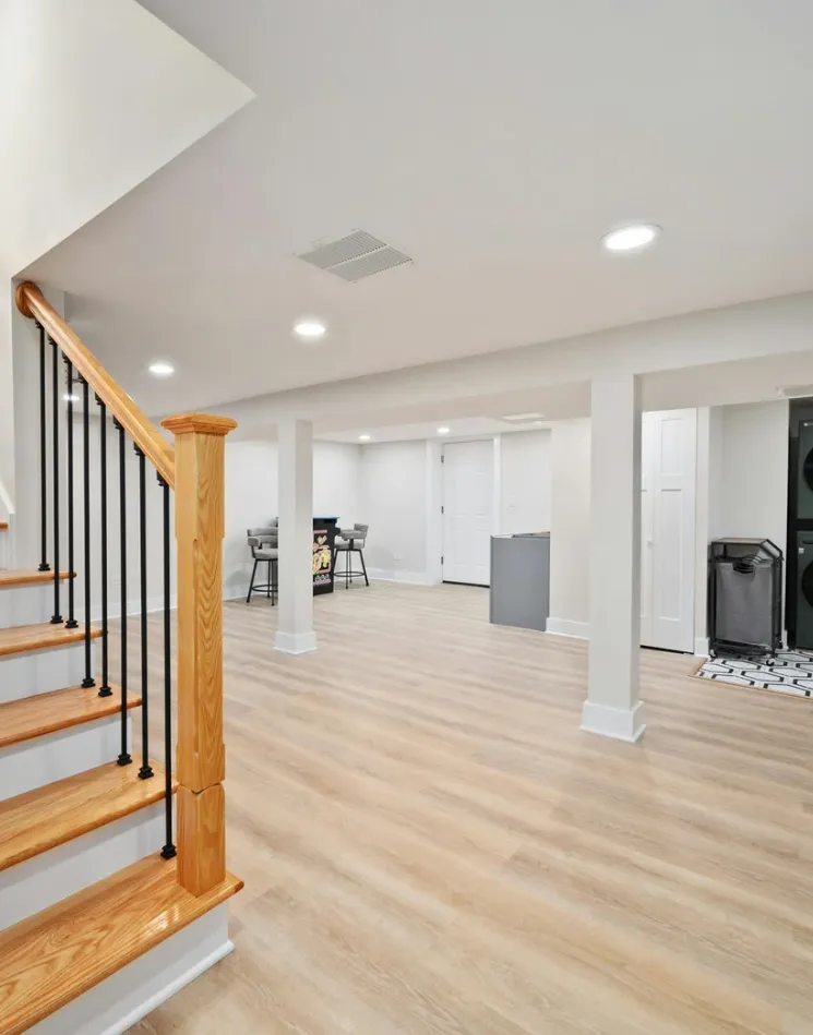 Basement renovation in Pineville featuring a basement bathroom and upgraded finishes
