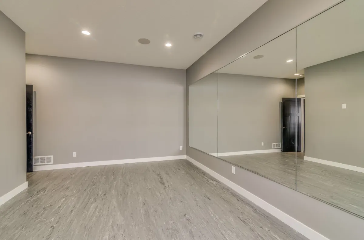 Finished basement in Cornelius featuring an entertainment space and clean finishes