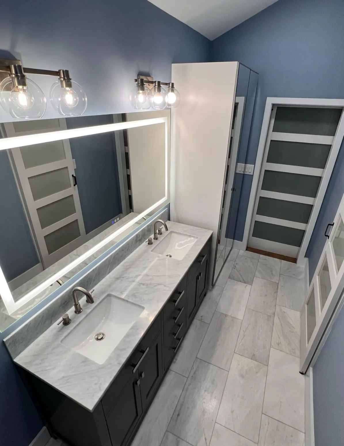 Master bathroom remodeling in Mint Hill featuring large-format tile and updated fixtures