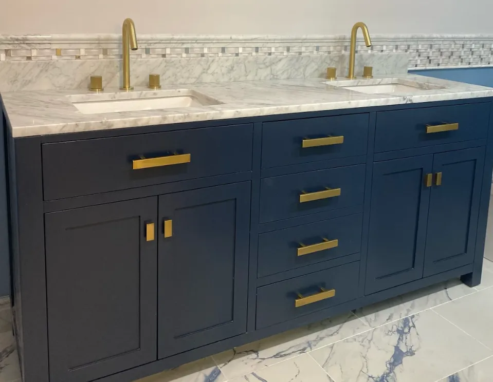 Master bathroom remodeling in Huntersville featuring a double vanity and upgraded lighting