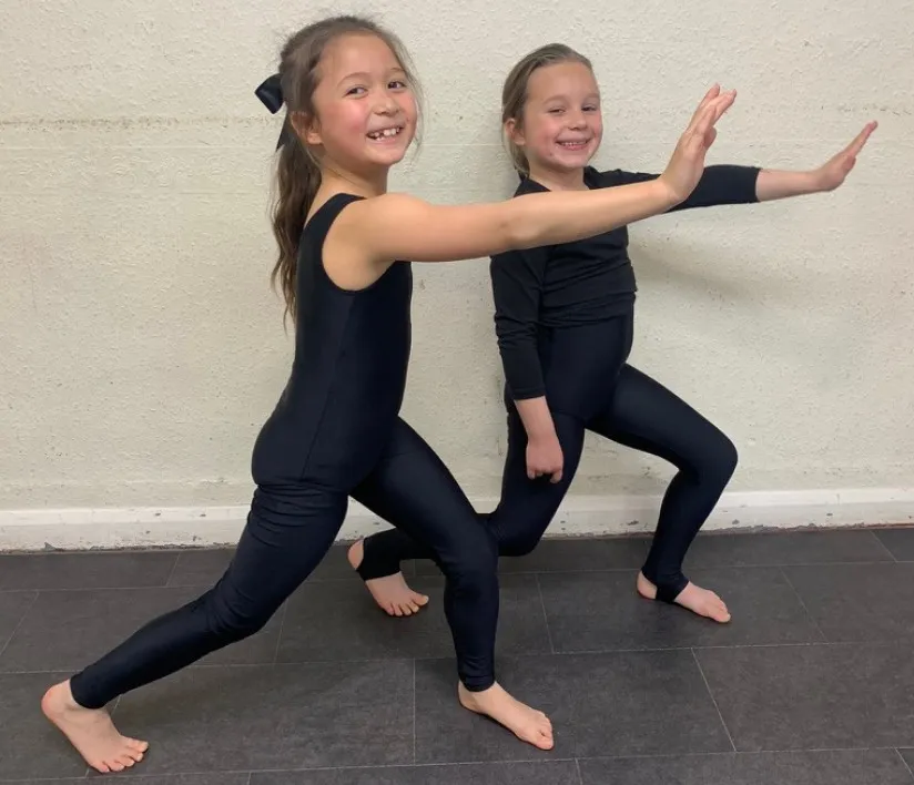 Two junior dancers aged 6 to 9 posing in a dance class at Deeping Dance Academy