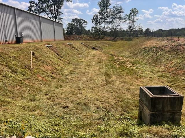 Stormwater pond routine vegetation maintenance outlet structure SC