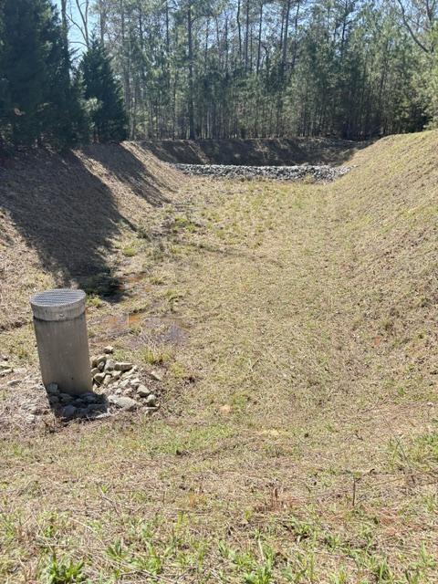 Stormwater pond slope erosion repair and sediment removal SC