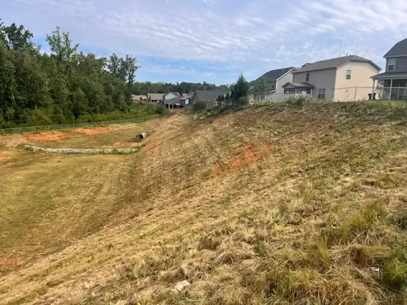 Retention pond bank erosion repair residential development