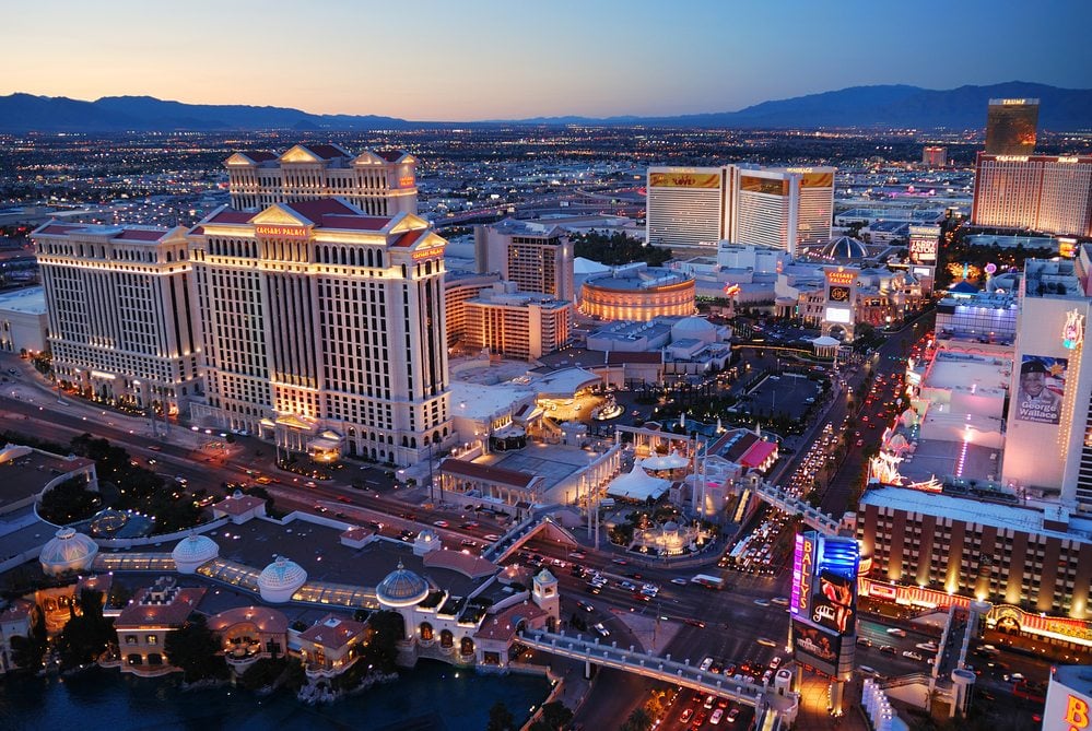 An aerial view of a resort surrounded by mountains