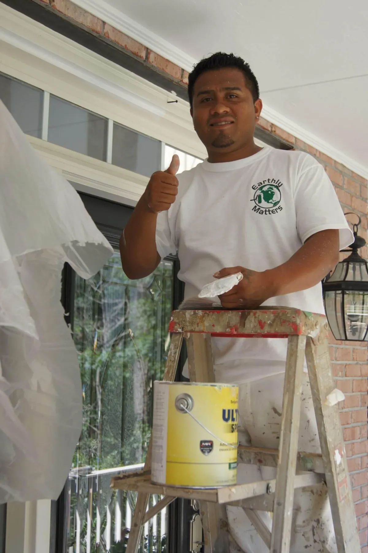 The stunning final approval of brick house in North Atlanta, showcasing a modern curb appeal transformation by Earthly Matters