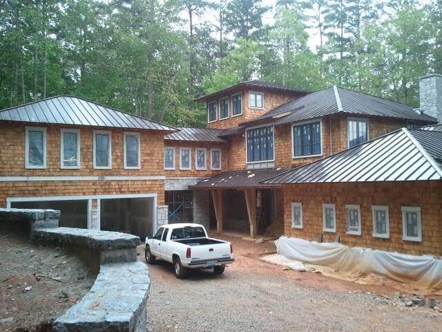 new construction exterior painting and staining project by Earthly Matters in North Atlanta
