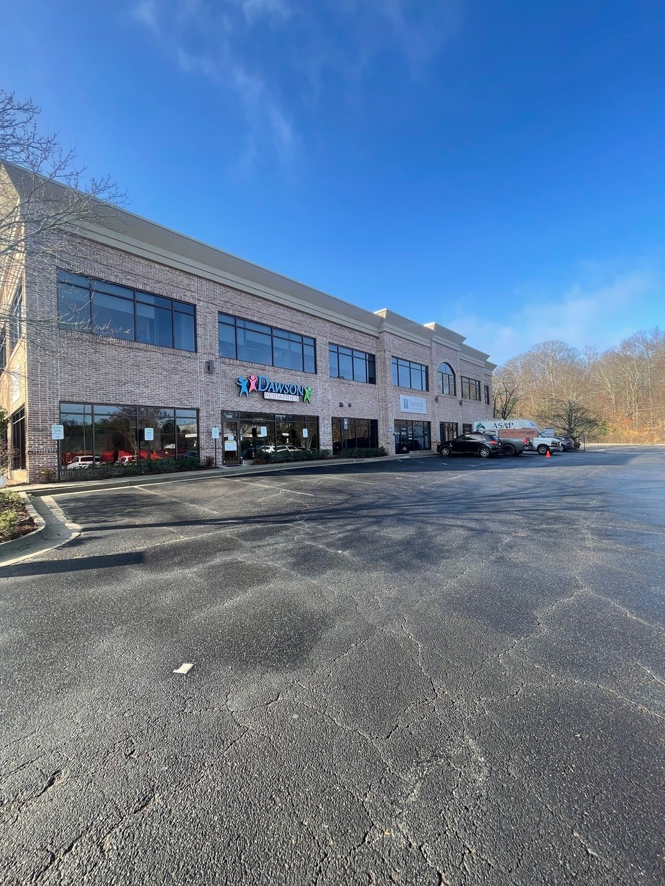 commercial exterior painting and brick maintenance for office building in North Atlanta