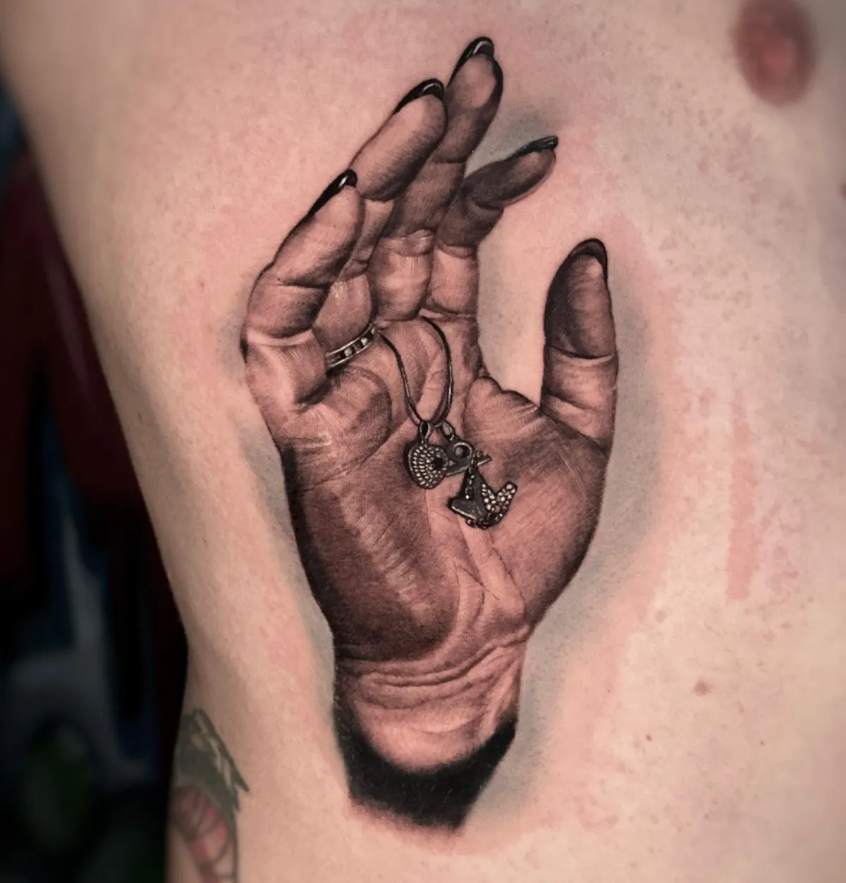 person in blue denim shorts and white nike sneakers standing on gray concrete floor