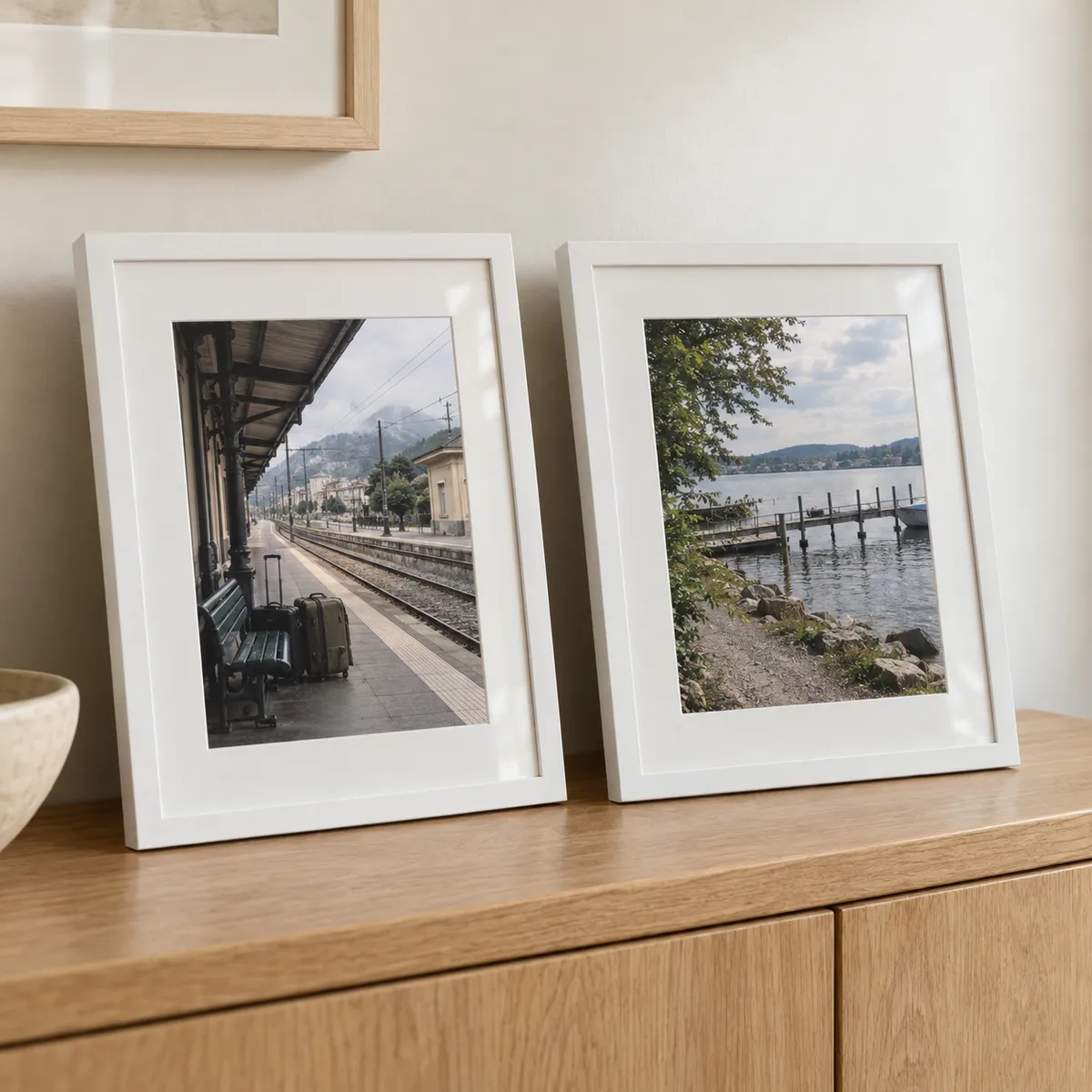 white 8x10 photo frames on a credenza