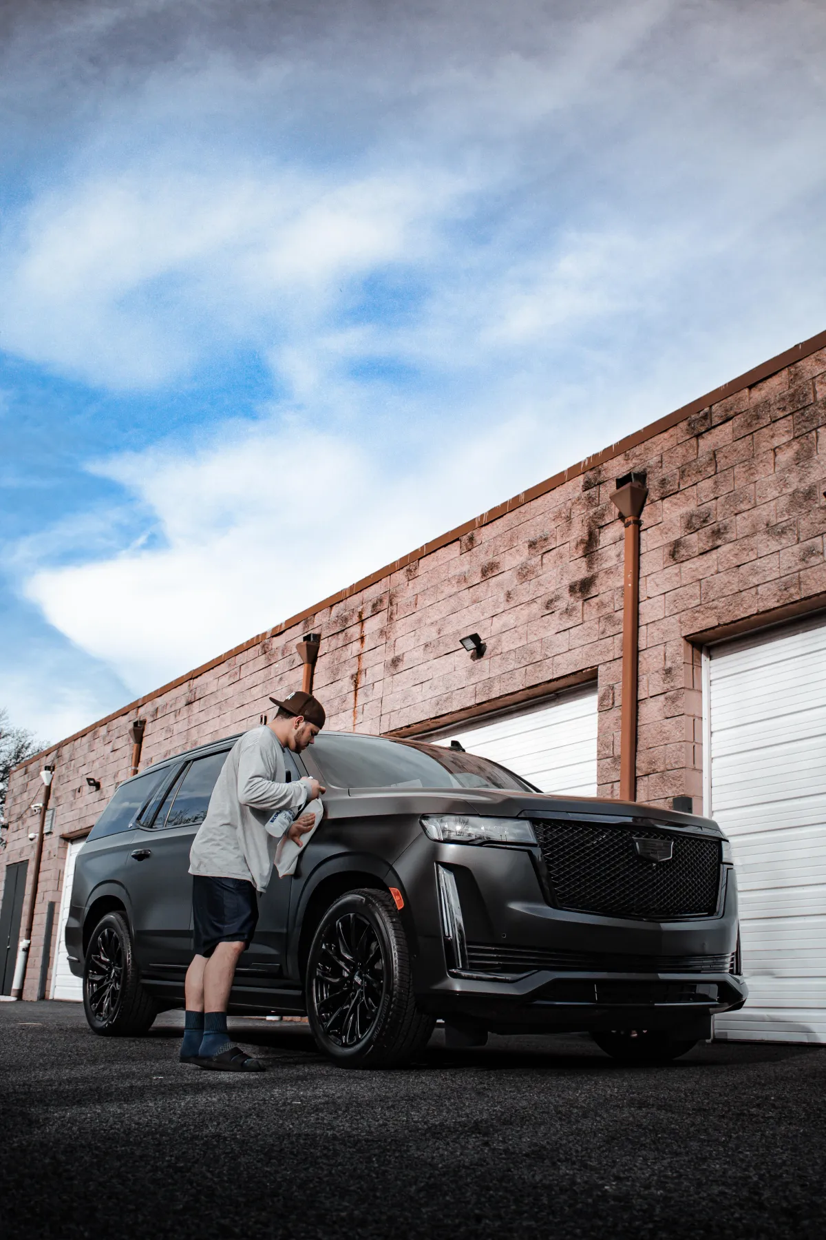 Clean and shiny Porsche leather stering wheel and red interior