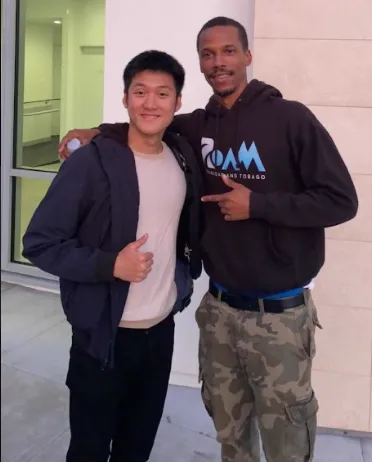 Alaric Moses Ong with Olympic Athlete Zwede Hewitt