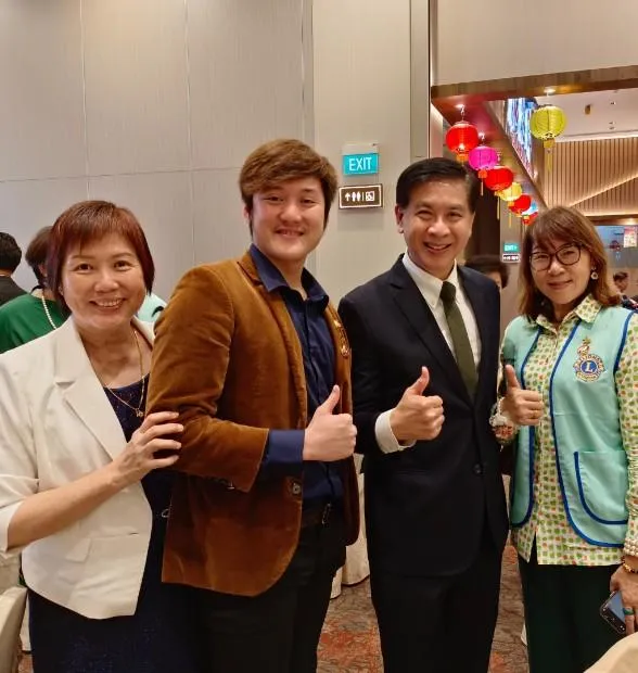 Alaric Ong with Mr Ang Wei Neng