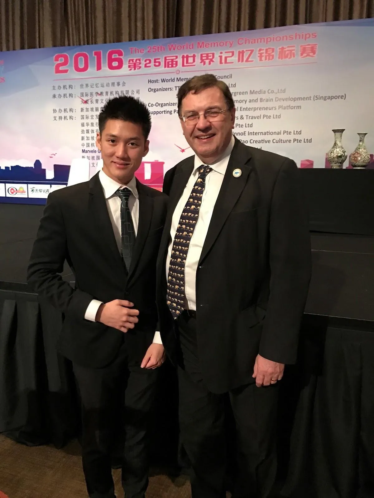 Alaric Ong with English chess grandmaster