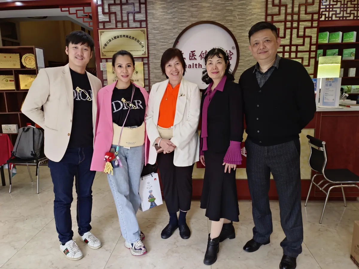 Alaric Ong with business partners in Wuhan, China.