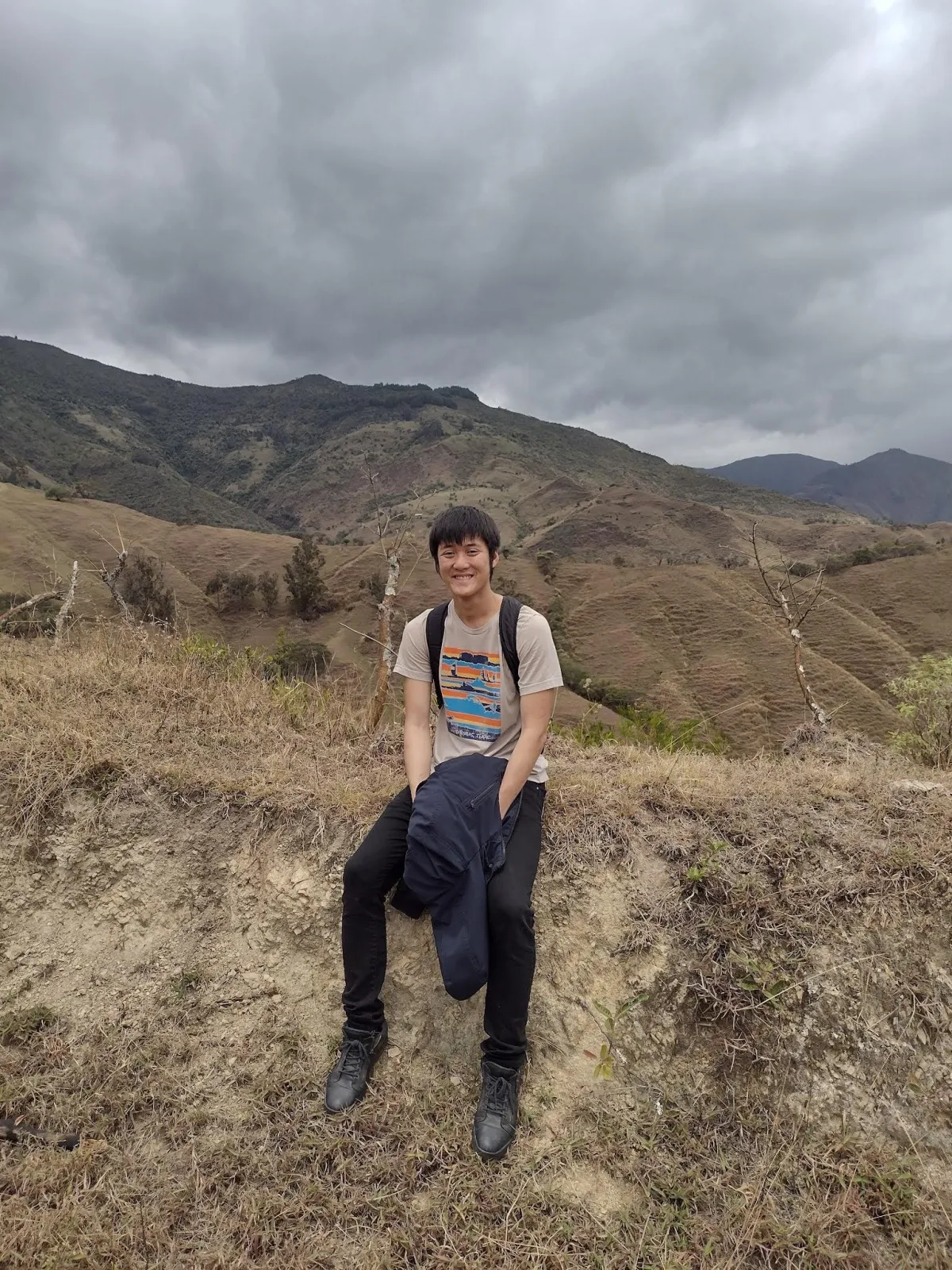 Alaric Ong at the peak of Mount Guaranga in Ecuador